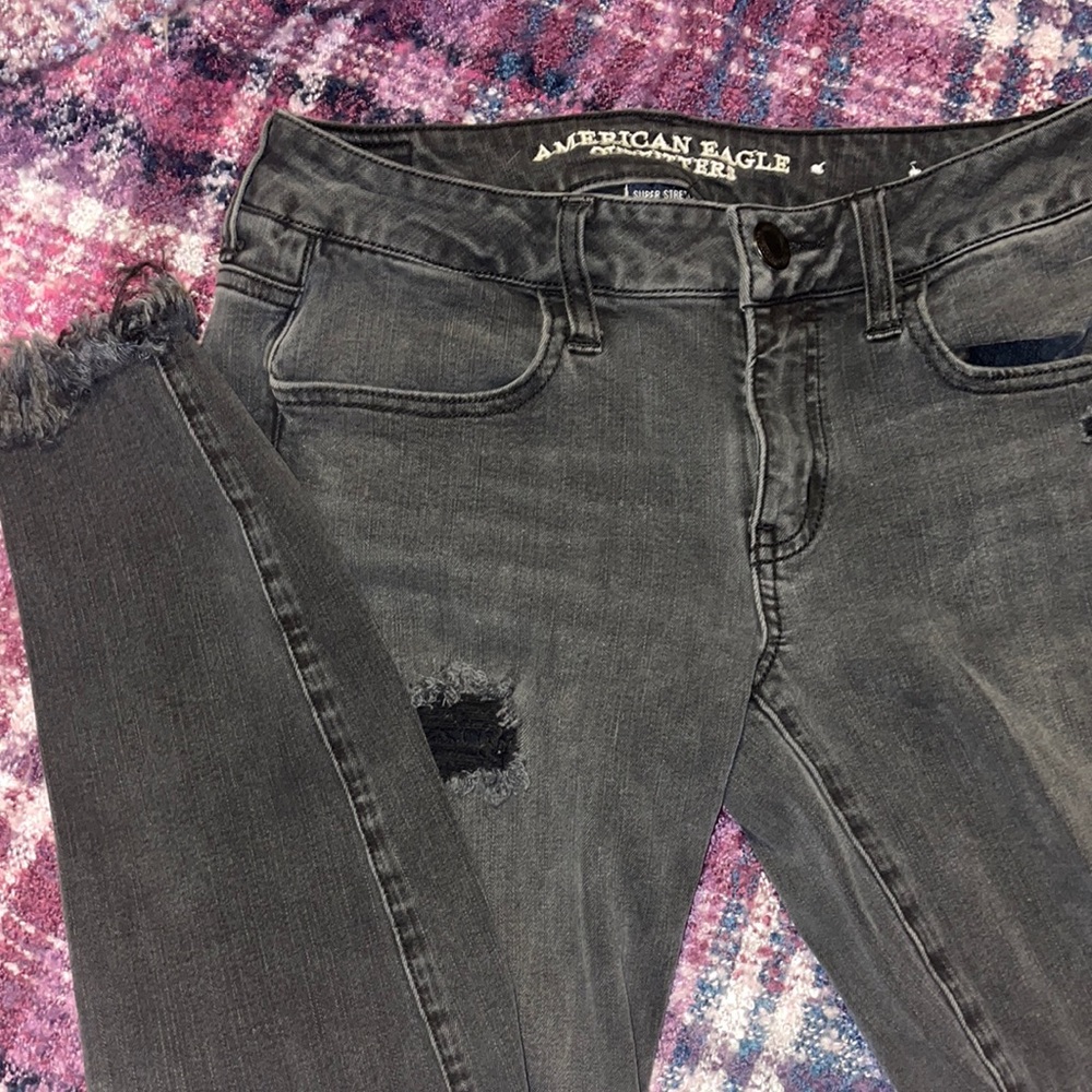 black torn jeans